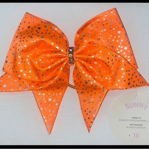 Never been worn “Sunny” Bows of London bow